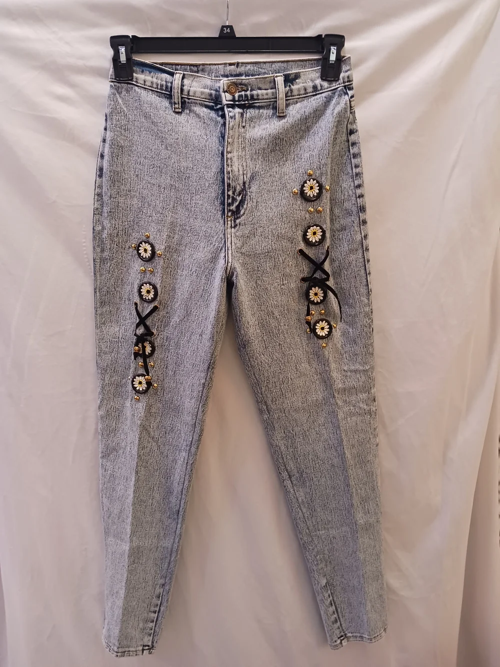 High-Rise Light Blue Jeans with Daisy Embellishments